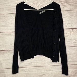 Anthropology Women’s black ribbed button up sweater. In excellent condition